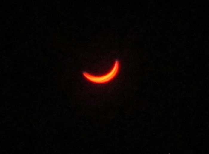 moon covering sun in solar eclipse