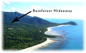 aerial view of the "town" of cape tribulation, myall beach in the foreground, Mt. Sorrow in the background