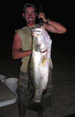 simon monk with a whopper of  a barra